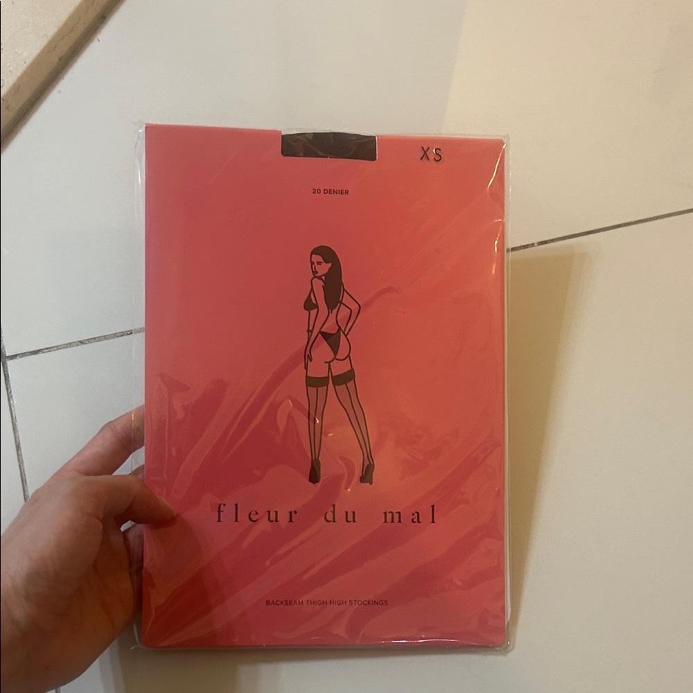 Fleur du Mal pink backseam thigh highs packaging